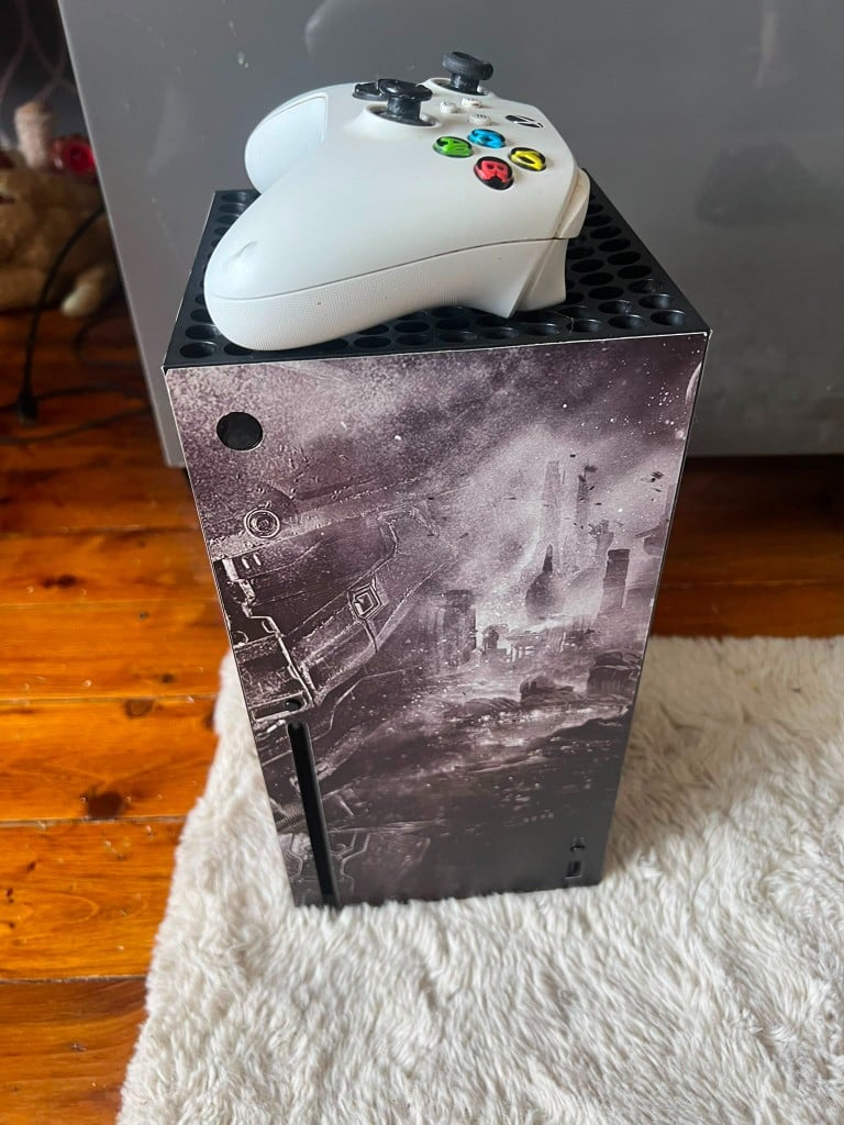 Xbox Series X console with custom skin and white controller