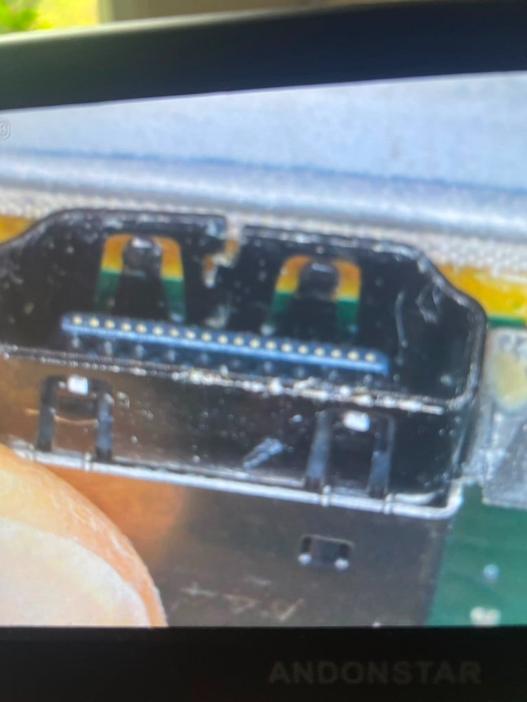 Microscope inspection of an HDMI port assembly